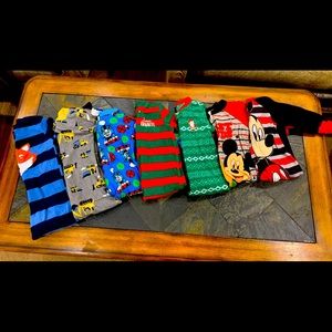 7 pairs Boy’s zip-up footed pjs.  Size 3T